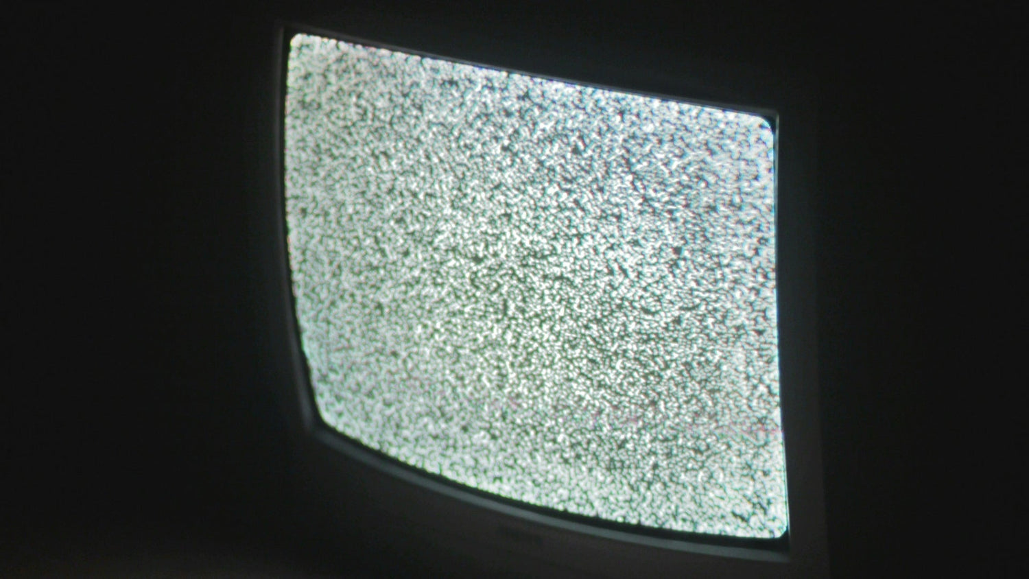 Vintage TV screen filled with white static — falling asleep to TV nostalgia — The Rad Rewind