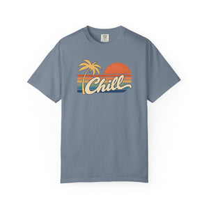 Blue Jean faded blue garment-dyed graphic tee with a retro sunset, leaning palm tree, faded stripes and cream Chill script, front view