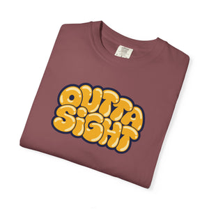 Brick red garment-dyed graphic tee with Outta Sight in puffy golden bubble letters, cream highlights and a navy outline, folded