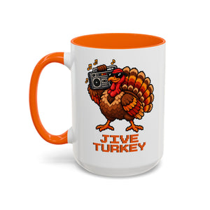 White 15 oz ceramic mug with an orange handle and orange interior, printed with a pixel-art turkey carrying a boombox over Jive Turkey lettering, handle on the left