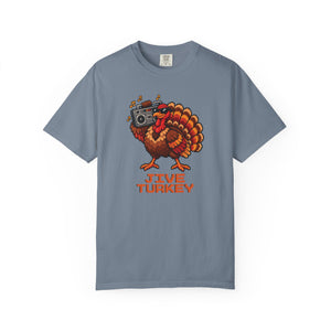 Blue Jean slate blue garment-dyed graphic tee with a pixel-art turkey in sunglasses carrying a boombox over Jive Turkey lettering, front view