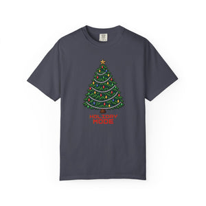 Navy blue-gray garment-dyed graphic tee with a pixel-art Christmas tree, colorful bulbs, silver garland and Holiday Mode lettering, front view