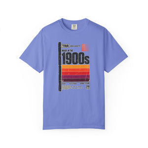 Flo Blue periwinkle garment-dyed graphic tee with a retro cassette tape label design reading Made in the 1900s, front view