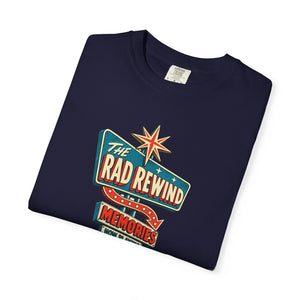 True Navy dark navy garment-dyed graphic tee with an ink-line retro roadside sign reading The Rad Rewind, Memories, Now Playing, Always Open, folded