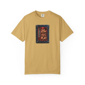 Mustard yellow garment-dyed tee with a weathered arcade coin door graphic reading 25¢ insert coin to play