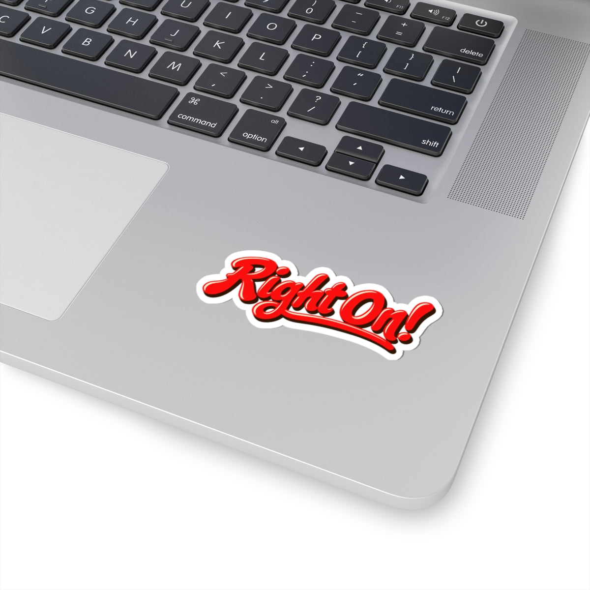 3 by 3 inch Right On! retro script sticker applied to a laptop beside the keyboard