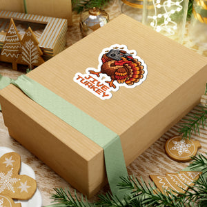 4 by 4 inch Jive Turkey pixel turkey sticker applied to a kraft gift box among holiday decorations
