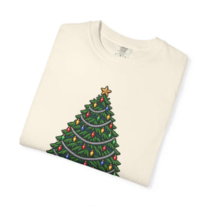 Ivory cream garment-dyed graphic tee with a pixel-art Christmas tree, colorful bulbs and silver garland, folded