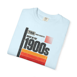 Chambray light blue garment-dyed graphic tee with a retro cassette tape label design reading Made in the 1900s, folded