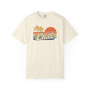 Ivory cream garment-dyed graphic tee with a retro sunset, leaning palm tree, faded stripes and cream Chill script, front view