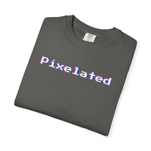 Folded flat-lay of the Pepper grey pixel glitch tee, highlighting the blocky 8-bit lettering and washed garment-dyed finish.
