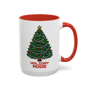 White 15 oz ceramic mug with a red handle and red interior, printed with a pixel-art Christmas tree, colorful bulbs, silver garland and Holiday Mode lettering, handle on the right